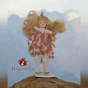 Dandee Dolls Porcelain Doll Blonde Hair Blue eyes Floral Dress 13 in